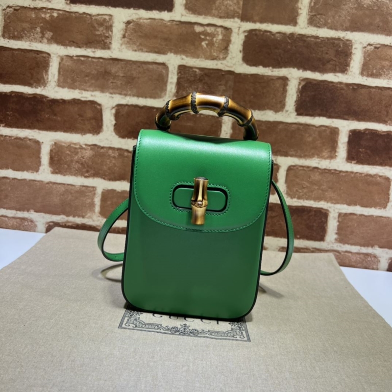 G*u*i top handle bags